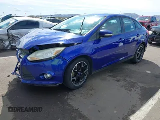 2013 Ford Focus SE with VIN 1FADP3F27DL138703, listed as a IAAI auction lot 41797537 with 128,070 mi miles. Bid and sale history available at carsss.com. Image 2.