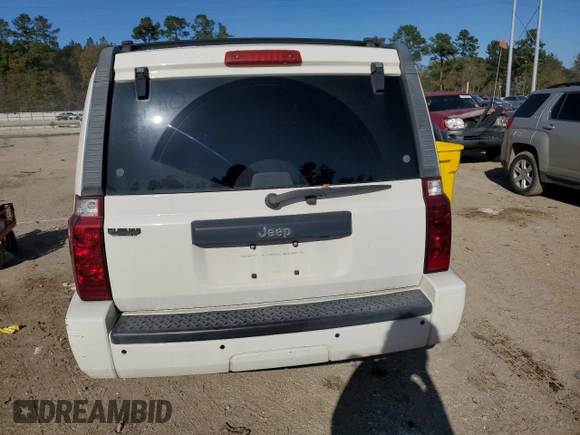 2010 Jeep Commander Sport with VIN 1J4RH4GK9AC113888, listed as a Copart auction lot 84553544 with 208,109 mi miles and Salvage title. Bid and sale history available at DreamBid. Image 6.