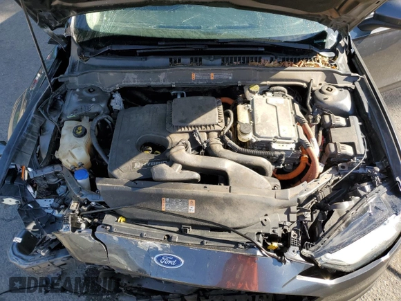 2018 Ford Fusion SE z VIN 3FA6P0LU9JR242443, wystawiony jako Copart lot #58049355 z przebiegiem 123 990 mil mil oraz Szkoda całkowita • Salvage title. Historia ofert i sprzedaży dostępna na DreamBid. Obrazek 11.