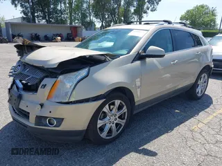 2011 Cadillac SRX Premium Collection z VIN 3GYFNCEY3BS506360, wystawiony jako IAAI lot #42096225 z przebiegiem 173 514 mil mil oraz . Historia ofert i sprzedaży dostępna na DreamBid. Obrazek 2.