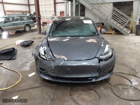 2021 Tesla Model 3 Performance with VIN 5YJ3E1EC3MF044802, listed as a IAAI auction lot 41891096 with 56,001 mi miles. Bid and sale history available at carsss.com. Image 12.