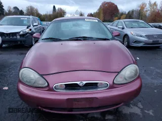 1996 Mercury Sable LS z VIN 1MELM53S9TG646191, wystawiony jako Copart lot #81002674 z przebiegiem 163 808 mil mil oraz Tytuł czysty. Historia ofert i sprzedaży dostępna na DreamBid. Obrazek 5.