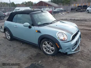 2013 MINI Cooper Convertible with VIN WMWZN3C53DT135427, listed as a IAAI auction lot 41954817 with 57,029 mi miles. Bid and sale history available at carsss.com. Image 1.