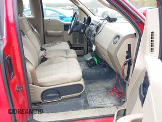 2005 Ford F-150 XL with VIN 1FTRF12WX5NC06045, listed as a IAAI auction lot 41917004 with 296,753 mi miles. Bid and sale history available at carsss.com. Image 5.