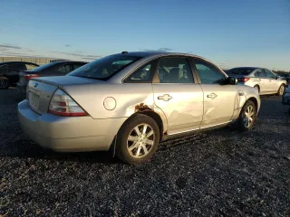 2009 Ford Taurus SEL with VIN 1FAHP24W79G103208, listed as a Copart auction lot 77621914 with 231,659 mi miles and Salvage Title. Bid and sale history available at carsss.com. Image 3.