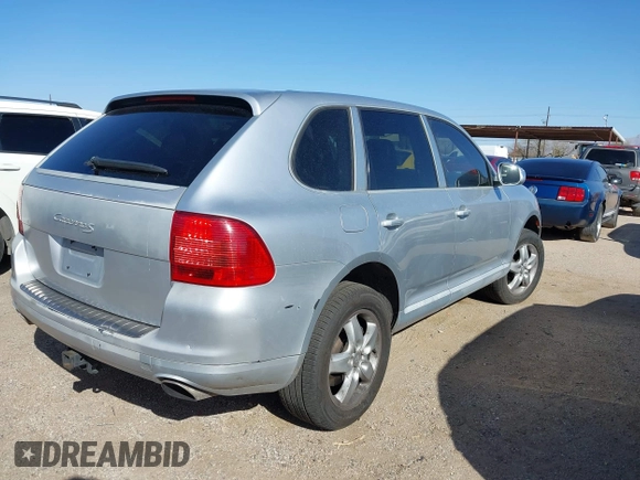 2005 Porsche Cayenne S with VIN WP1AB29P75LA62851, listed as a IAAI auction lot 41685787 with 143,711 mi miles. Bid and sale history available at carsss.com. Image 4.