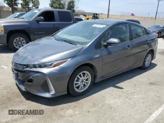 2021 Toyota Prius LE with VIN JTDKAMFPXM3174518, listed as a Copart auction lot 58854495 with 83,445 mi miles and Salvage title. Bid and sale history available at DreamBid. Image 1.