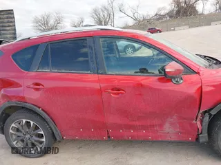 2016 Mazda CX-5 Grand Touring with VIN JM3KE4DY8G0729446, listed as a IAAI auction lot 41871207 with 89,258 mi miles. Bid and sale history available at carsss.com. Image 14.