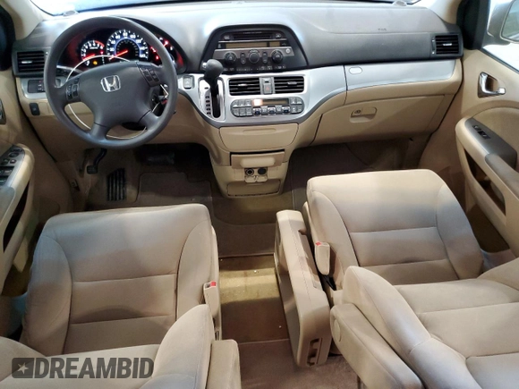 2009 Honda Odyssey EX с VIN 5FNRL38479B019599, выставлен на аукционе Copart как лот 56375175 с пробегом 241 526 миль миль и Списание • Salvage title. История ставок и продаж доступна на DreamBid. Изображение 8.