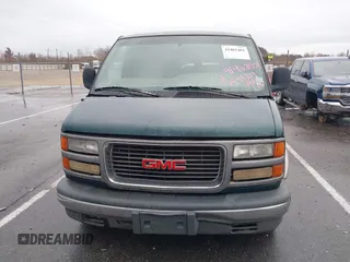 1997 GMC Savana with VIN 1GDFG15R6V1004277, listed as a IAAI auction lot 41462401 with 495,223 mi miles. Bid and sale history available at carsss.com. Image 6.