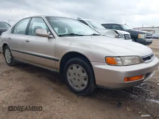 1997 Honda Accord LX with VIN JHMCD5638VC000719, listed as a IAAI auction lot 42190141 with 325,010 mi miles and . Bid and sale history available at carsss.com. Image 1.