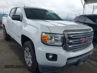 2015 GMC Canyon 2WD SLE with VIN 1GTG5BE31F1177142, listed as a IAAI auction lot 42065808 with 117,237 mi miles and . Bid and sale history available at DreamBid. Image 1.