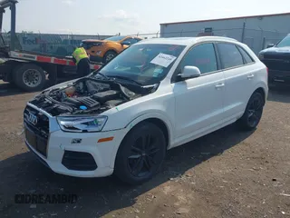 2017 Audi Q3 Premium z VIN WA1ECCFS7HR009402, wystawiony jako IAAI lot #42462248 z przebiegiem 46 536 mil mil oraz . Historia ofert i sprzedaży dostępna na DreamBid. Obrazek 2.