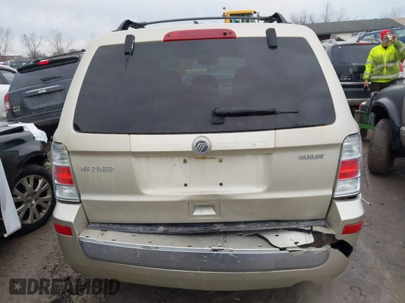 2011 Mercury Mariner z VIN 4M2CN8B76BKJ06851, wystawiony jako IAAI lot #41652014 z przebiegiem 118 914 mil mil oraz . Historia ofert i sprzedaży dostępna na DreamBid. Obrazek 16.