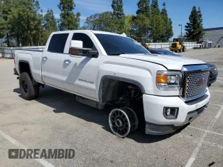 2015 GMC Sierra 2500HD available WiFi Denali with VIN 1GT120E80FF659215, listed as a Copart auction lot 48356455 with 134,796 mi miles and Salvage Title. Bid and sale history available at carsss.com. Image 4.