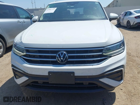 2022 Volkswagen Tiguan SE with VIN 3VV3B7AX7NM032705, listed as a IAAI auction lot 41987713 with 34,010 mi miles and . Bid and sale history available at DreamBid. Image 12.