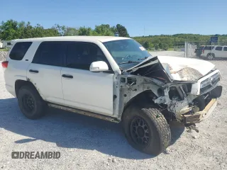 2010 Toyota 4Runner Trail with VIN JTEBU5JR7A5003159, listed as a Copart auction lot 52128125 with 227,274 mi miles and Salvage Title. Bid and sale history available at DreamBid. Image 4.