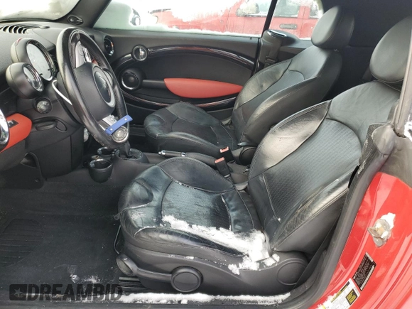 2010 MINI Convertible with VIN WMWMR3C57ATU97979, listed as a Copart auction lot 45903855 with 154,614 mi miles and Salvage Title. Bid and sale history available at DreamBid. Image 7.