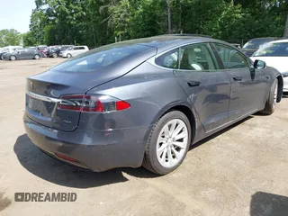 2018 Tesla Model S 75D with VIN 5YJSA1E24JF292518, listed as a IAAI auction lot 42247256 with 40,160 mi miles and . Bid and sale history available at DreamBid. Image 4.