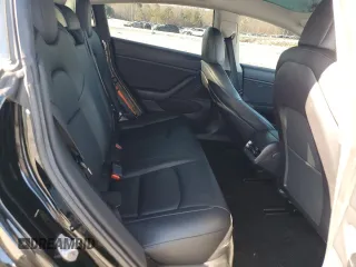 2019 Tesla Model 3 Mid Range with VIN 5YJ3E1EA3KF324201, listed as a Copart auction lot 43221185 with 117,606 mi miles and Salvage Title. Bid and sale history available at carsss.com. Image 10.