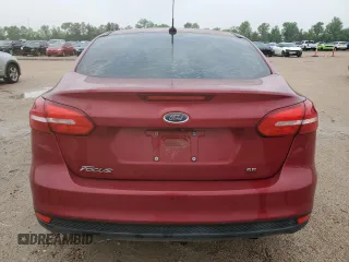 2017 Ford Focus SE z VIN 1FADP3F25HL299153, wystawiony jako Copart lot #53908065 z przebiegiem 108 745 mil mil oraz Szkoda całkowita • Salvage title. Historia ofert i sprzedaży dostępna na DreamBid. Obrazek 6.