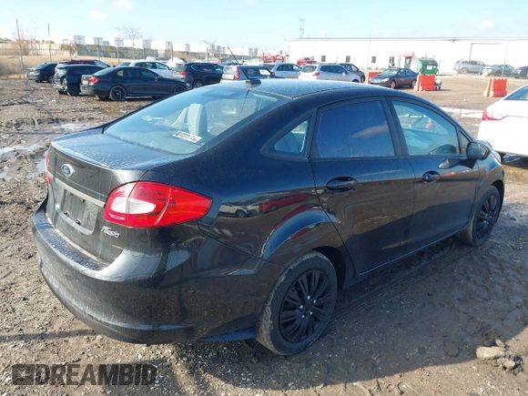 2013 Ford Fiesta S z VIN 3FADP4AJ2DM129703, wystawiony jako IAAI lot #41669041 z przebiegiem 138 831 mil mil oraz . Historia ofert i sprzedaży dostępna na DreamBid. Obrazek 4.