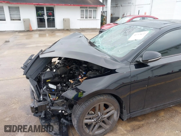 2020 Kia Forte GT-Line with VIN 3KPF34ADXLE165818, listed as a IAAI auction lot 41753657 with 58,079 mi miles. Bid and sale history available at carsss.com. Image 6.