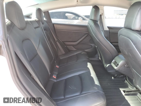 2021 Tesla Model 3 Standard Range Plus with VIN 5YJ3E1EA7MF978749, listed as a Copart auction lot 43377955 with 51,871 mi miles and Salvage Title. Bid and sale history available at carsss.com. Image 10.