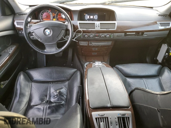 2006 BMW 7 Series 750i with VIN WBAHL83506DT05674, listed as a Copart auction lot 77176834 with 263,495 mi miles and Salvage title. Bid and sale history available at DreamBid. Image 8.