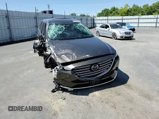 2018 Mazda CX-9 Grand Touring with VIN JM3TCADY5J0200052, listed as a Copart auction lot 55160715 with 68,464 mi miles and Salvage title. Bid and sale history available at DreamBid. Image 14.
