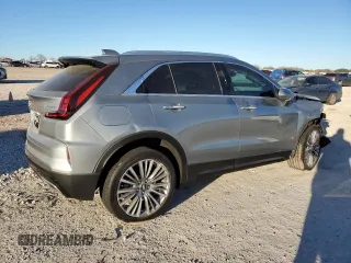 2024 Cadillac XT4 FWD Premium Luxury with VIN 1GYFZCR47RF213944, listed as a Copart auction lot 87674675 with 1,606 mi miles and Salvage title. Bid and sale history available at DreamBid. Image 3.