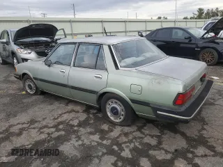 1981 Mazda 626 z VIN JM1GB2216B0531636, wystawiony jako Copart lot #85505404 z przebiegiem 41 816 mil mil oraz Szkoda całkowita • Salvage title. Historia ofert i sprzedaży dostępna na DreamBid. Obrazek 2.