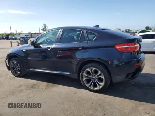 2013 BMW X6 xDrive35i z VIN 5UXFG2C50DL785065, wystawiony jako Copart lot #57036985 z przebiegiem 135 515 mil mil oraz Tytuł czysty. Historia ofert i sprzedaży dostępna na DreamBid. Obrazek 2.