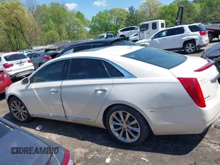 2014 Cadillac XTS Luxury with VIN 2G61M5S32E9310910, listed as a IAAI auction lot 41978298 with Not provided miles and . Bid and sale history available at DreamBid. Image 14.