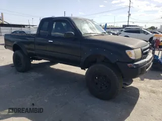 1999 Toyota Tacoma with VIN 4TAWN72N2XZ503012, listed as a Copart auction lot 51633105 with 120,244 mi miles and Salvage title. Bid and sale history available at DreamBid. Image 4.
