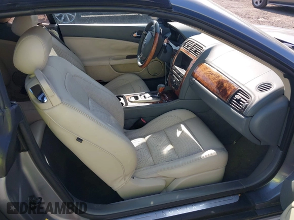 2007 Jaguar XK with VIN SAJWA44B075B11143, listed as a IAAI auction lot 42044257 with 122,842 mi miles. Bid and sale history available at carsss.com. Image 5.