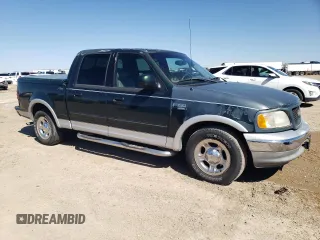2001 Ford F-150 XLT with VIN 1FTRW07L21KF52515, listed as a Copart auction lot 48303905 with 236,567 mi miles and Salvage title. Bid and sale history available at DreamBid. Image 4.