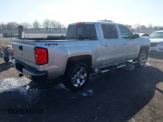 2015 Chevrolet Silverado 1500 LTZ with VIN 3GCUKSEC3FG429454, listed as a IAAI auction lot 41763577 with 134,503 mi miles. Bid and sale history available at carsss.com. Image 4.