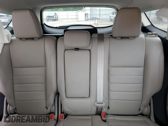 2013 Ford Escape SEL с VIN 1FMCU9H98DUA51653, выставлен на аукционе Copart как лот 57997595 с пробегом 138 483 миль миль и Списание • Salvage title. История ставок и продаж доступна на DreamBid. Изображение 10.