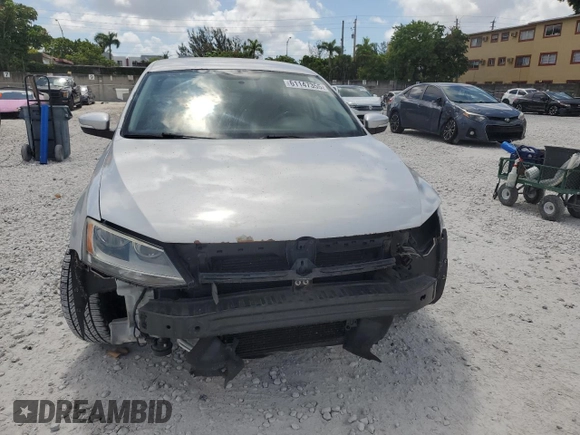 2013 Volkswagen Jetta SE z VIN 3VWDP7AJ8DM354734, wystawiony jako Copart lot #61147355 z przebiegiem 103 428 mil mil oraz Szkoda całkowita • Salvage title. Historia ofert i sprzedaży dostępna na DreamBid. Obrazek 5.