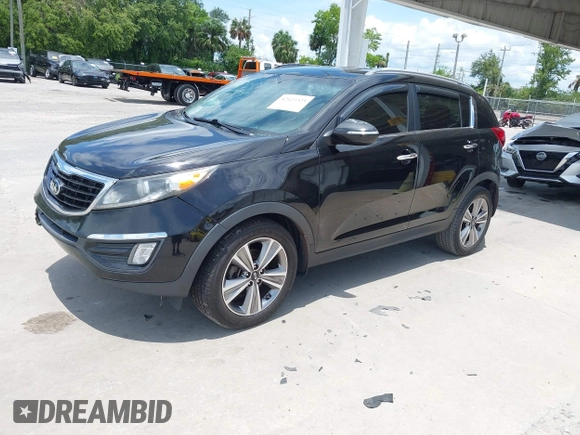 2014 Kia Sportage SX with VIN KNDPC3A66E7585269, listed as a IAAI auction lot 42423325 with 173,517 mi miles and . Bid and sale history available at DreamBid. Image 2.