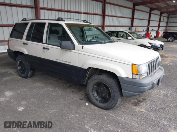 1997 Jeep Grand Cherokee Laredo z VIN 1J4GZ58S7VC737980, wystawiony jako IAAI lot #42256142 z przebiegiem 188 958 mil mil oraz . Historia ofert i sprzedaży dostępna na DreamBid. Obrazek 1.