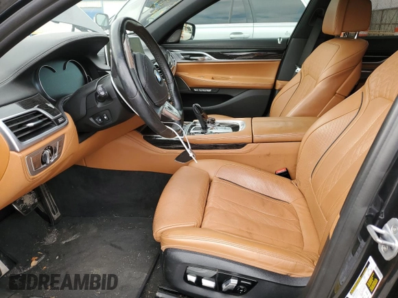 2018 BMW 7 Series 750i with VIN WBA7F0C55JGM23795, listed as a Copart auction lot 81168143 with 114,285 mi miles and Salvage Title. Bid and sale history available at carsss.com. Image 7.