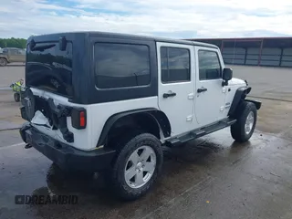 2013 Jeep Wrangler Unlimited Sport with VIN 1C4BJWDG4DL599151, listed as a IAAI auction lot 42212831 with 143,865 mi miles and . Bid and sale history available at DreamBid. Image 4.