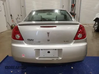 2006 Pontiac G6 6-Cyl z VIN 1G2ZG558764174412, wystawiony jako Copart lot #45677485 z przebiegiem 286 524 mil mil oraz Czysty tytuł • Clean title. Historia ofert i sprzedaży dostępna na DreamBid. Obrazek 6.