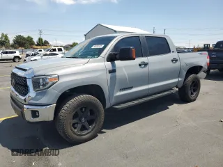 2018 Toyota Tundra SR5 z VIN 5TFDY5F10JX682099, wystawiony jako Copart lot #60888005 z przebiegiem 94 912 mil mil oraz Szkoda całkowita • Salvage title. Historia ofert i sprzedaży dostępna na DreamBid. Obrazek 1.