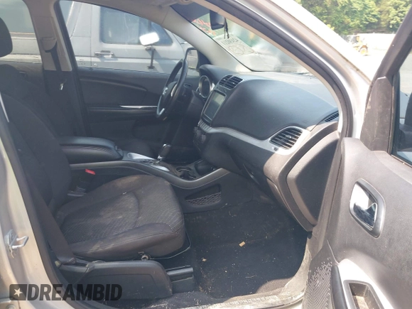 2013 Dodge Journey SXT with VIN 3C4PDDBG3DT661924, listed as a IAAI auction lot 42430211 with Not provided miles and . Bid and sale history available at DreamBid. Image 5.