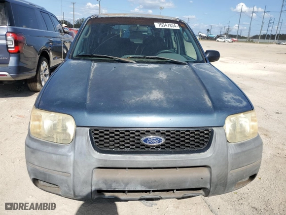 2001 Ford Escape XLS with VIN 1FMYU01BX1KB53168, listed as a Copart auction lot 76547834 with 71,025 mi miles and Salvage Title. Bid and sale history available at carsss.com. Image 5.