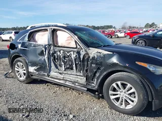 2014 Infiniti QX70 with VIN JN8CS1MU2EM451932, listed as a IAAI auction lot 41439834 with 125,781 mi miles and . Bid and sale history available at DreamBid. Image 6.