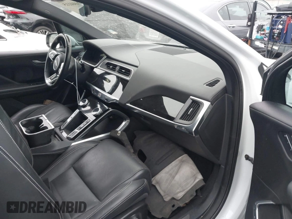 2020 Jaguar I-Pace SE with VIN SADHC2S14L1F85800, listed as a IAAI auction lot 42444115 with 51,249 mi miles and . Bid and sale history available at DreamBid. Image 5.